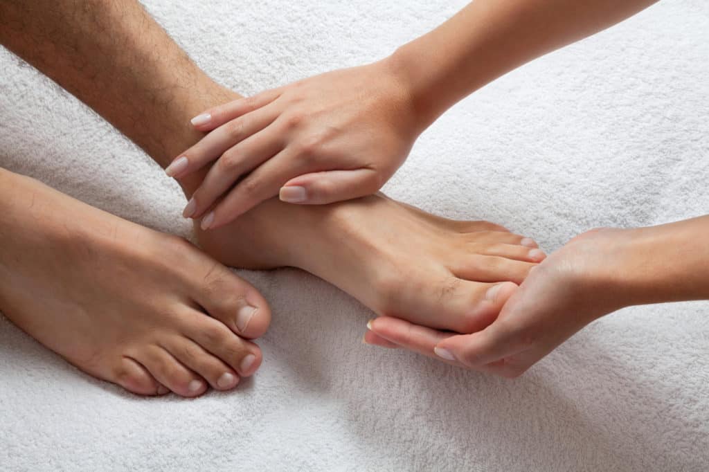 man getting Foot care massage