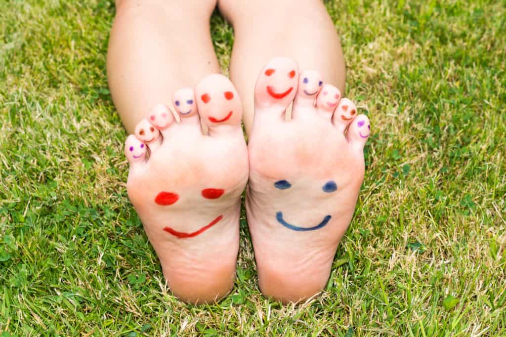 Feet with happy faces on